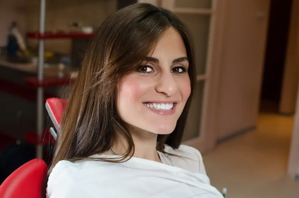 Patient smiling after dental fillings
